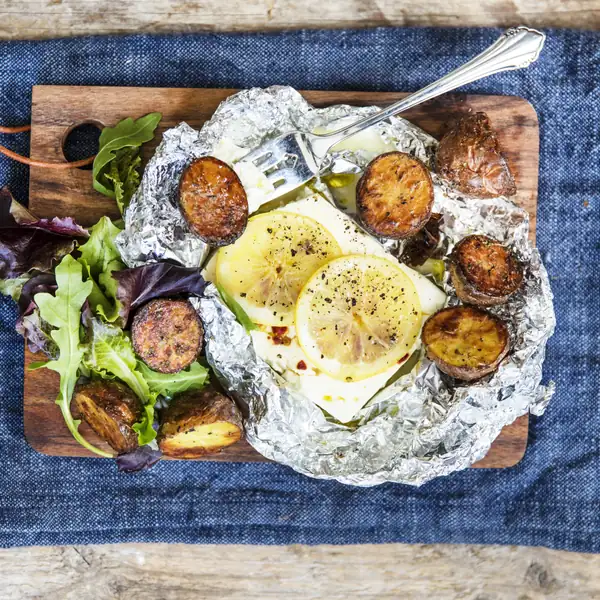 Baked feta cheese with roasted potatoes