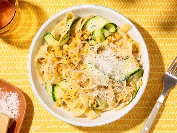 Roasted corn carbonara with zucchini strips
