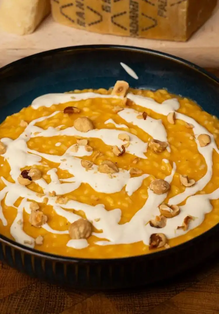 Pumpkin risotto, toasted hazelnuts, and Grana Padano fondue