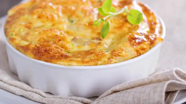 Fluffy zucchini and onion casserole in the oven