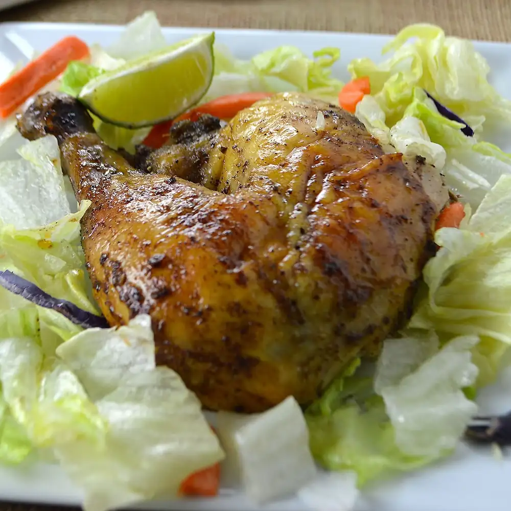 Oven-roasted chicken on a bottle/can