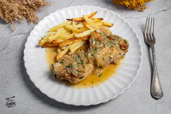 Chicken in cider. Grandma's traditional homemade recipe