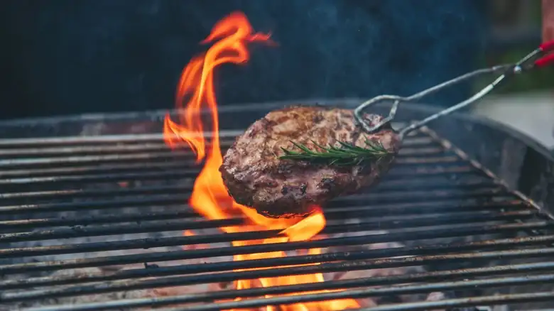 Never Cook On A Public Grill Without This Crucial Prep Step