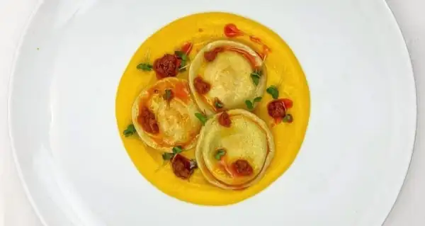 Ricotta and Smoked Quails Egg Ravioli with Butternut Squash Velouté