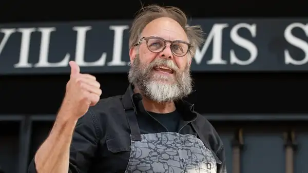 The Unexpected Cooking Method Alton Brown Swears By For Burgers