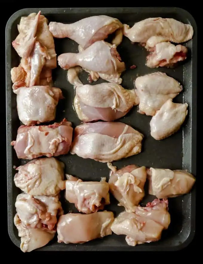 how to cut a whole chicken(for grilling,baking and curries)