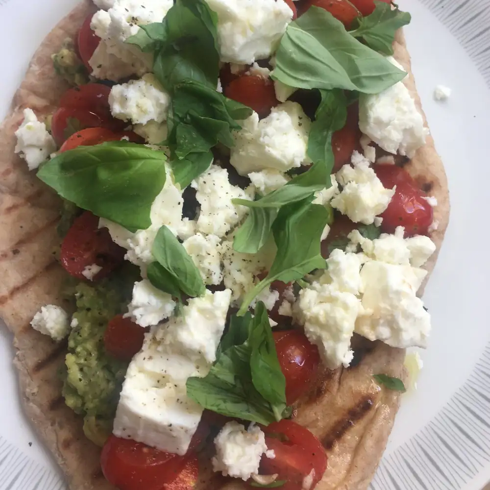 Breakfast flatbread with avocado, tomato salsa and feta