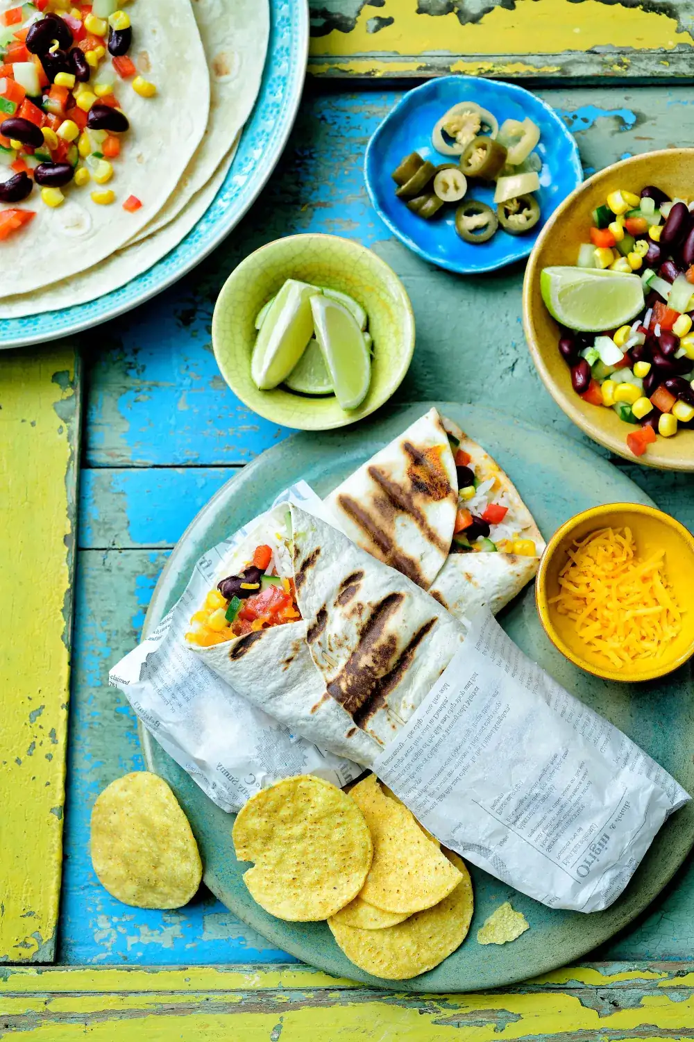 Veggie burrito with jackfruit, cheddar cheese, and corn salsa