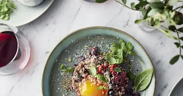 Spicy tartare and scrambled egg yolks