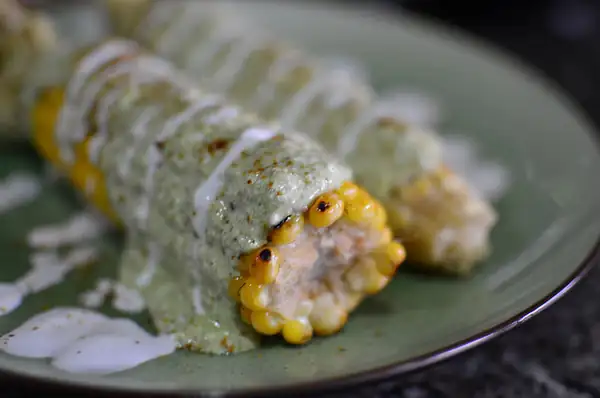 Grilled Corn with Scent leaf-Coconut-Feta Sauce