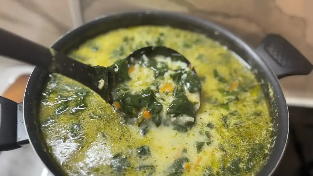 Classic spinach soup with egg filling