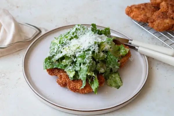 Chicken schnitzel with Caesar salad