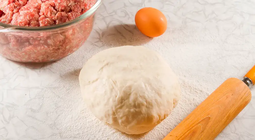 Choux pastry with egg and boiling water for dumplings