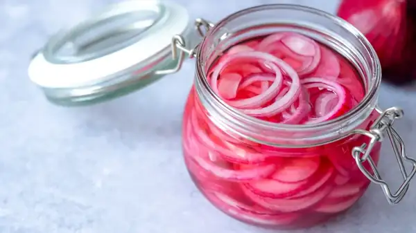 Pickled Red Onions Are The Tangy Topping Your Nachos Deserve