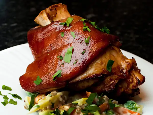 Pork knuckle in beer and apple juice