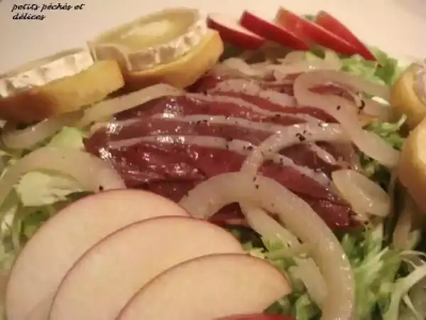 Recipe for warm duck confit and goat cheese salad