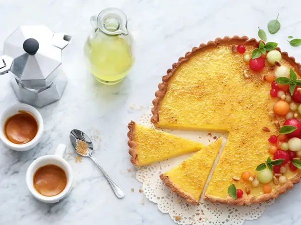 Caramelized limoncello tart with colorful melon salad