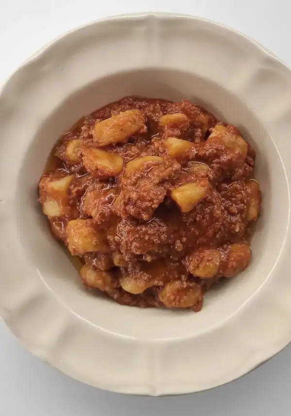 Pumpkin gnocchi with sausage ragù