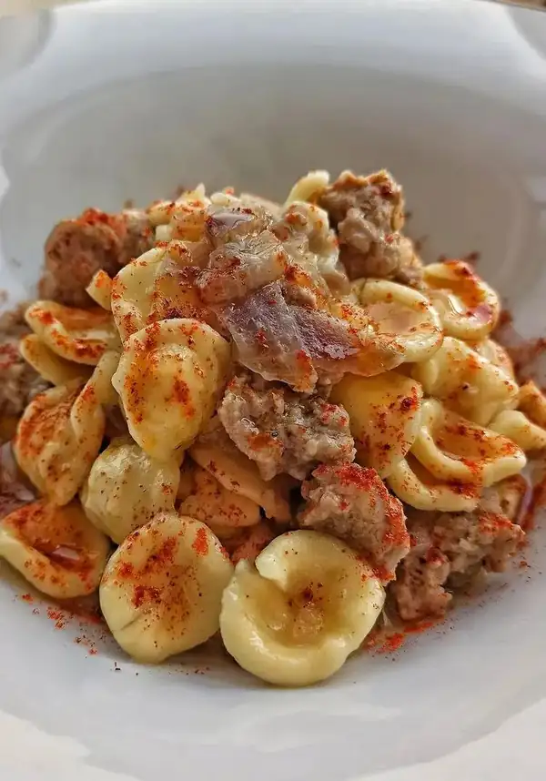 Orecchiette with onion, sausage, and crusco pepper