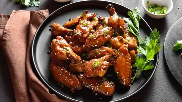 The Flavor Pitfall To Watch Out For When Cooking Chicken Wings With Baking Soda