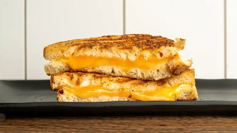 The Crunchy Breakfast Item That Will Take Your Grilled Cheese To The Next Level
