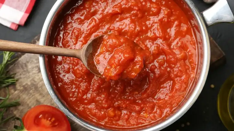 Why Marcella Hazan's Famous Tomato Sauce Calls For Half An Onion, Not Diced