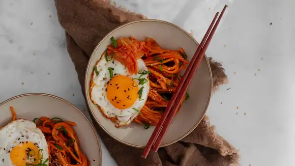 You can have these cheesy kimchi noodles on the table in 15 minutes