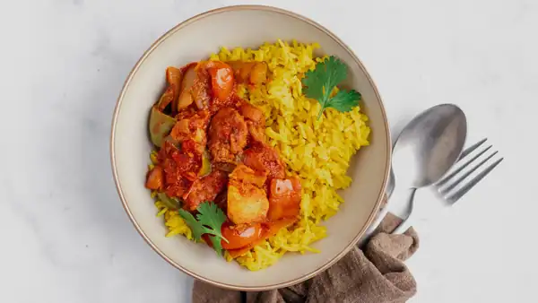 Indian chicken jalfrezi with yellow rice