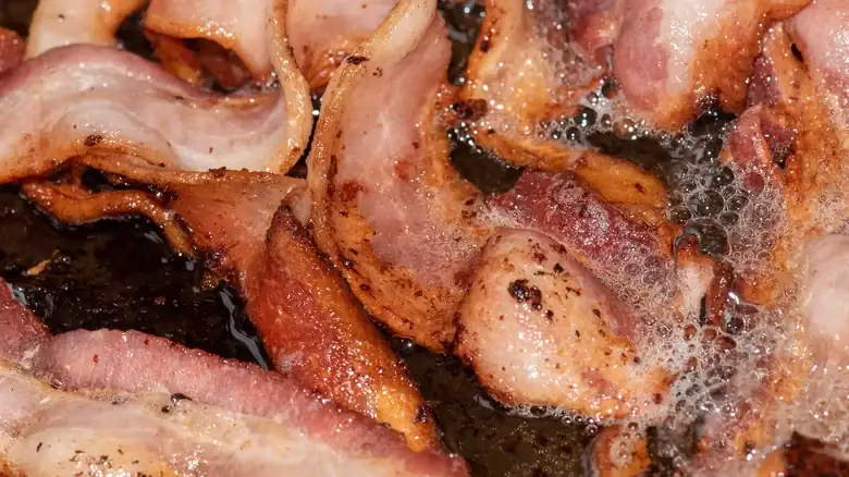 The Pantry Staple That Makes Bacon Crispier Than Ever