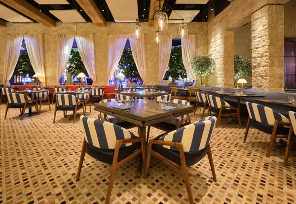 Bobby Flay’s New Seafood Restaurant Sweeps in the Refreshing Vibe of the Amalfi Coast