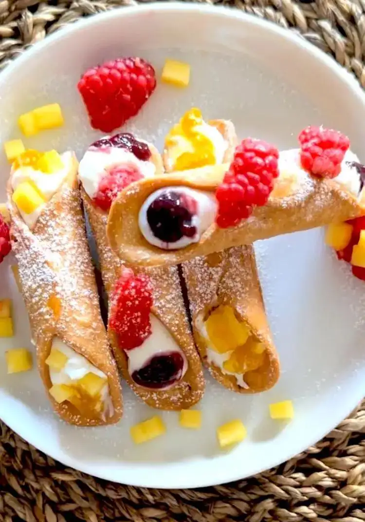 Cannoli with ricotta cream, mango and peach compote, raspberry and mulberry compote, Grandma's preserves