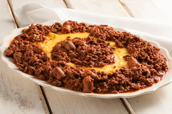 Polenta with braised beef in tomato sauce