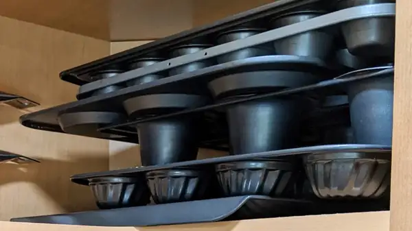 One Genius Storage Technique For Baking Pans Can Open Up Tons Of Kitchen Space