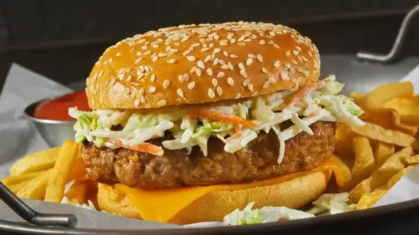 The Simple Reason To Swap Your Burger's Lettuce For Cabbage