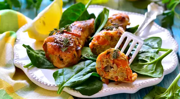 Muslos de pollo rellenos de champiñones