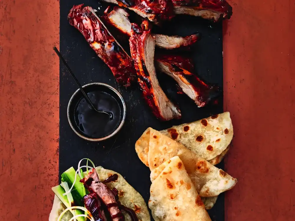Peking-style ribs with pancakes and plum sauce