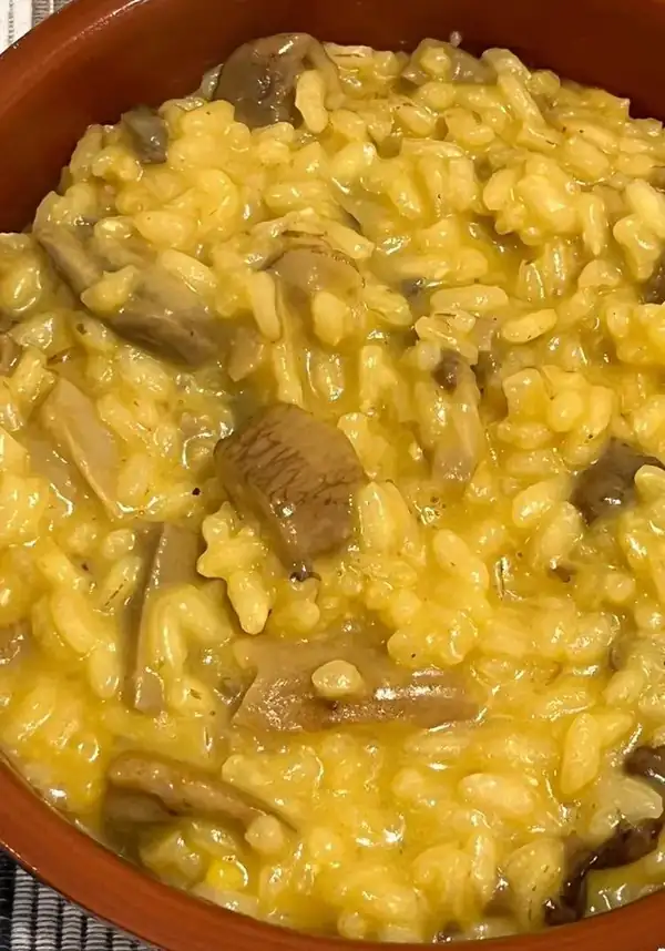 Saffron risotto with porcini mushrooms and Taleggio cheese