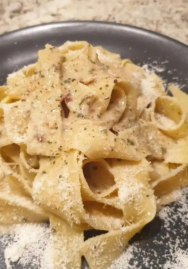 Pappardelle with butter flavored with toasted hazelnuts and sage
