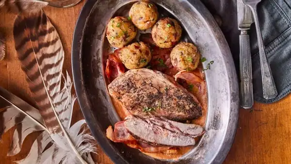 Pheasant in port wine with baked bacon dumplings