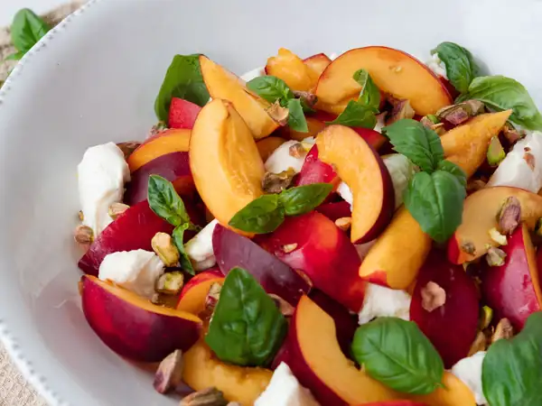 Caprese with nectarine and pistachio