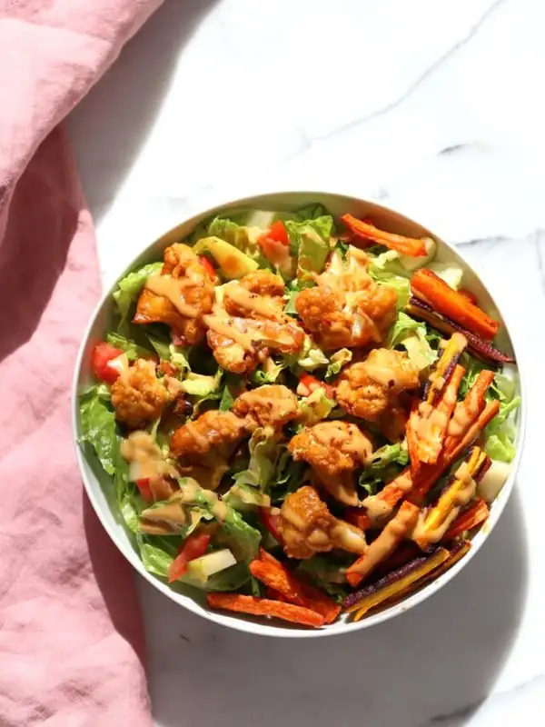 Peanut Butter Cauliflower Bowl with Roasted Carrots