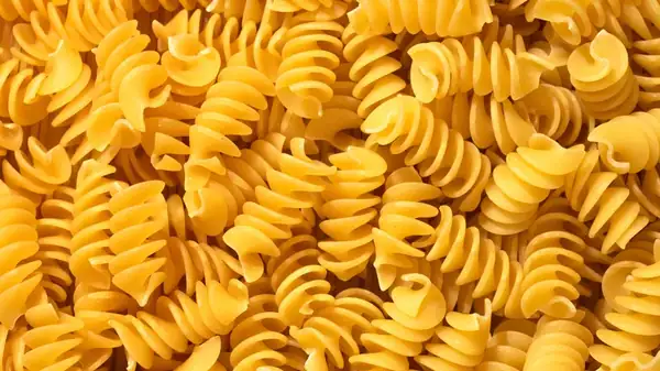 Leftover Pasta Water Has A Secret Use, And It Might Keep Your Pans Cleaner