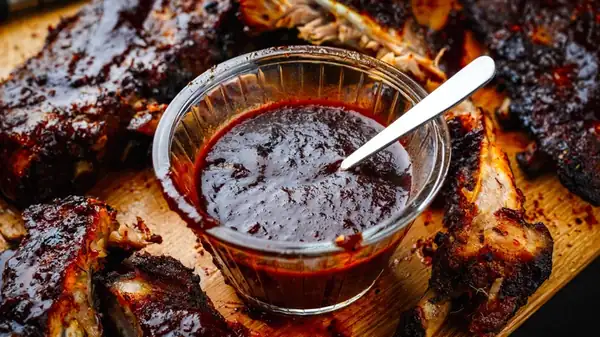 Sweet And Sticky Pork Ribs Call For This Classic Ingredient Collecting Dust In Your Pantry