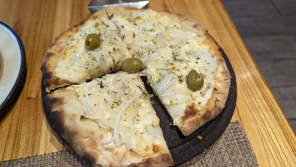 Argentine fugazzeta, the pizza stuffed with cheese and onion