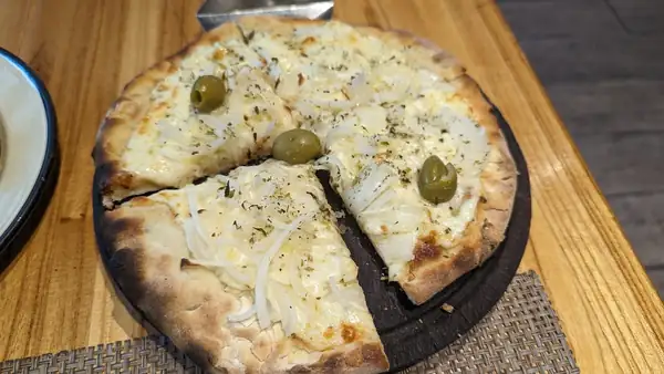 Argentine fugazzeta, the pizza stuffed with cheese and onion