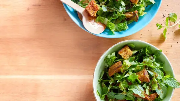 Romaine lettuce with balsamic and mint dressing and turmeric croutons