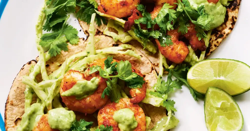 Spiced prawn tacos with avocado lime crema