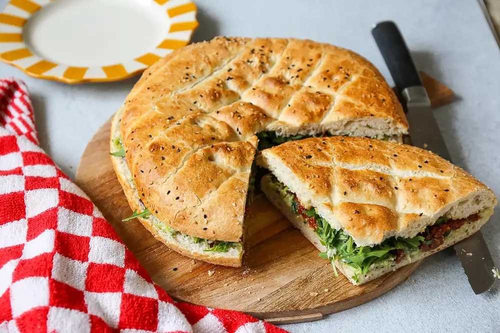 Turkish bread with aged cheese pesto salad