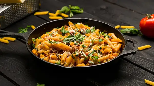 The Do's And Don'ts For Cooking Pasta Directly In Sauce