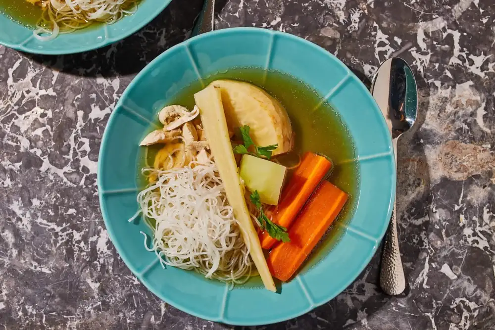 Chicken soup with rice noodles